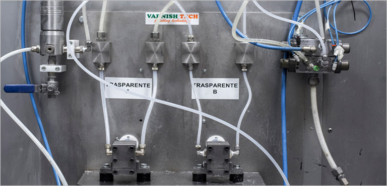 Mixing unit with gear pumps provided with Varnish Tech gears. The paint is conveyed to the mixing unit, and subsequently to the paint gun.